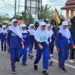 Sambut HUT RI ke-79 Tahun 2024, Camat Simpang Renggiang Lepas Lomba Gerak Jalan Tingkat Kecamatan