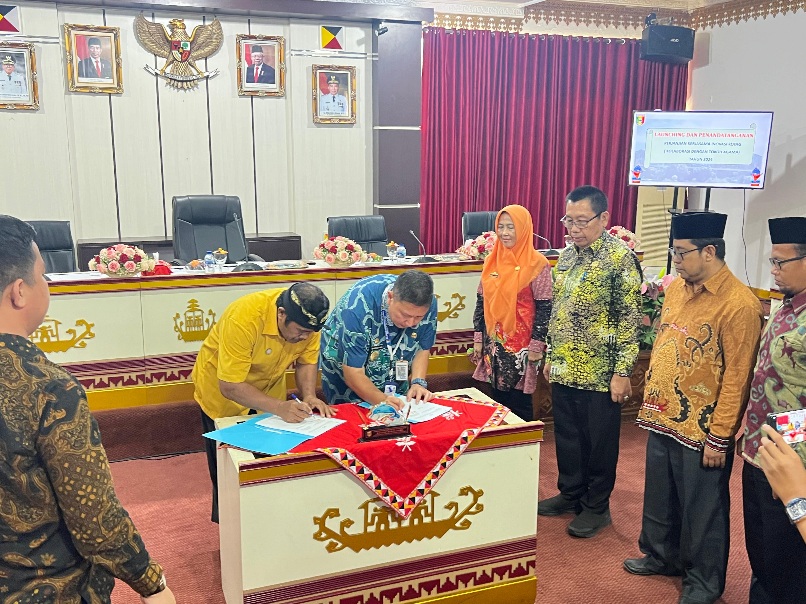 PJ.Sekda Ir.Suaidi,MM., Launching dan Penandatangan Perjanjian Kerjasama Inovasi Penerbitan Akte Perkawinan Melalui, Kolaborasi dengan Tokoh Agama(KOTA)